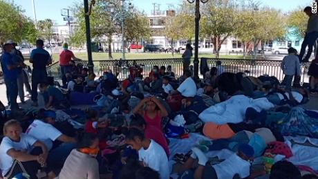 A gazebo in Reynosa, Mexico, is packed with migrants after authorities ordered them away from a bridge by the border.