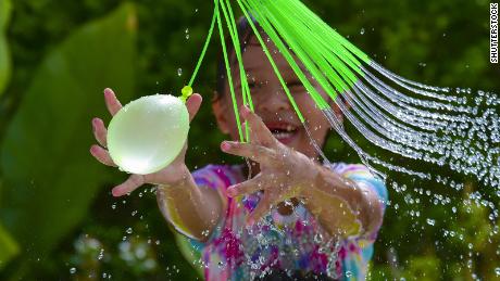 A water balloon fight is a perfect summer activity.
