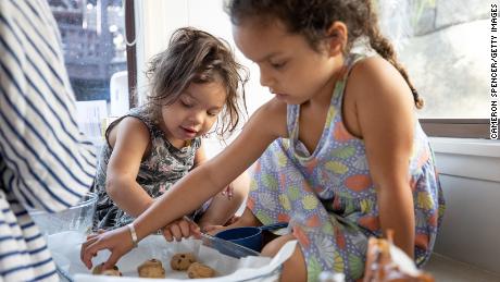 Making cookies together can be as fun as eating cookies together.