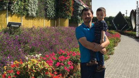 Amannisa Abdullah's husband Ahmad Talip and their son, Musa, in Dubai.