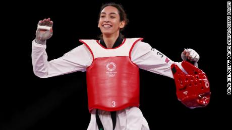 Alizadeh celebrates after defeating Jade Jones of Team Great Britain.
