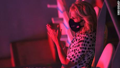 Biden watches the opening ceremony in the Olympic Stadium.