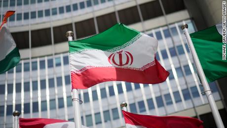 The flag of Iran is seen in front of the building of the International Atomic Energy Agency (IAEA) Headquarters on May 24, 2021 in Vienna, Austria.