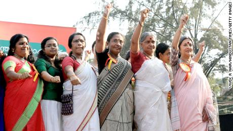 Women gather to participate in the 620-kilometer "Women's Wall" against gender discrimination in Kerala, 2019.