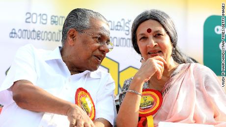 Chief Minister Pinarayi Vijayan with an activist during the "Women's Wall" protests in 2019.