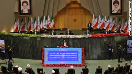 Iran's newly elected President Ebrahim Raisi (C) speaks at his swearing in ceremony at the Iranian parliament in the capital Tehran on August 5, 2021.
