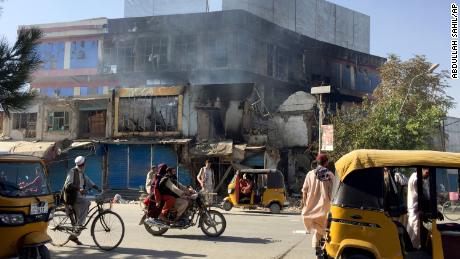 Shops damaged after fighting between Taliban and Afghan security forces in Kunduz, northern Afghanistan, on Aug. 8, 2021. 