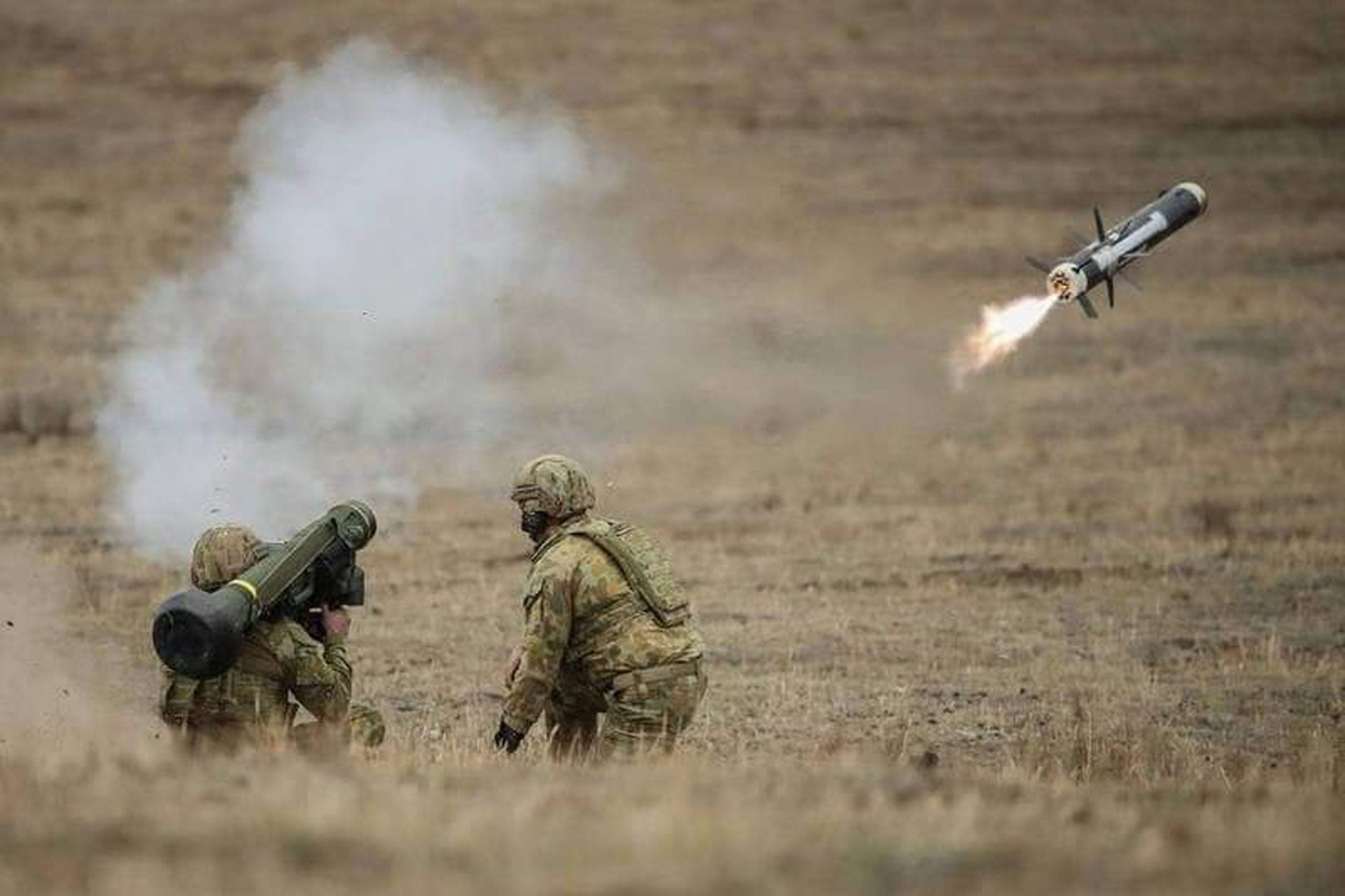 In this file photo from Feb. 13, Ukrainian soldiers fire a Javelin missile provided by the US Army during an exercise in Ukraine.