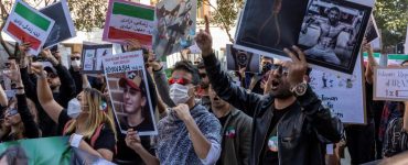 Iran protests rage on streets as officials renew threats
