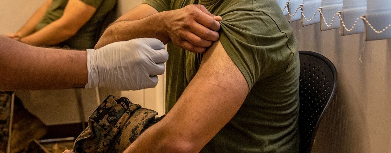 Pentagon officially rescinds Covid-19 vaccine requirement for troops